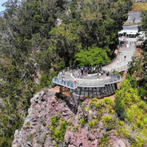Aerial view of a viewing platform surrounded by trees, overlooking Nuns Valley.